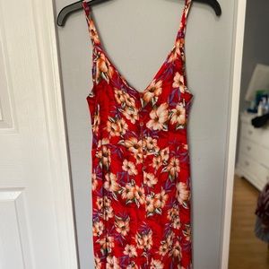 A red floral romper